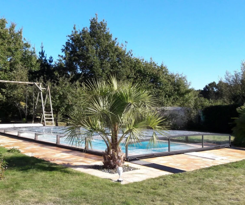 Abri de piscine coulissant semi haut